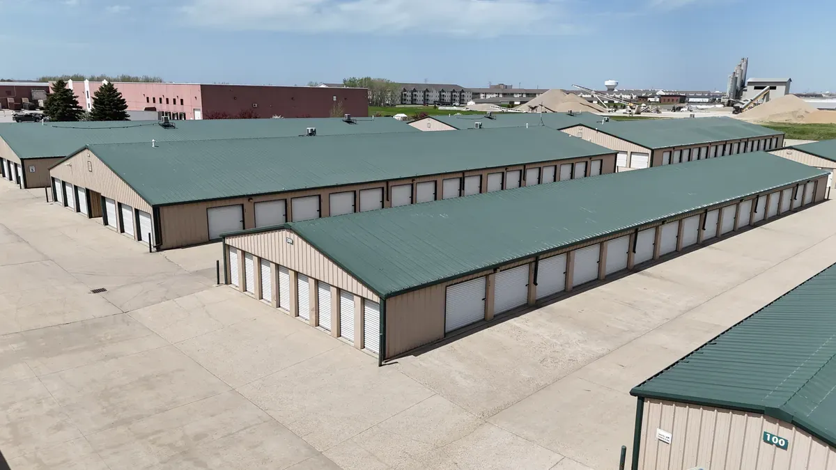 Aerial view of facility with drive up units